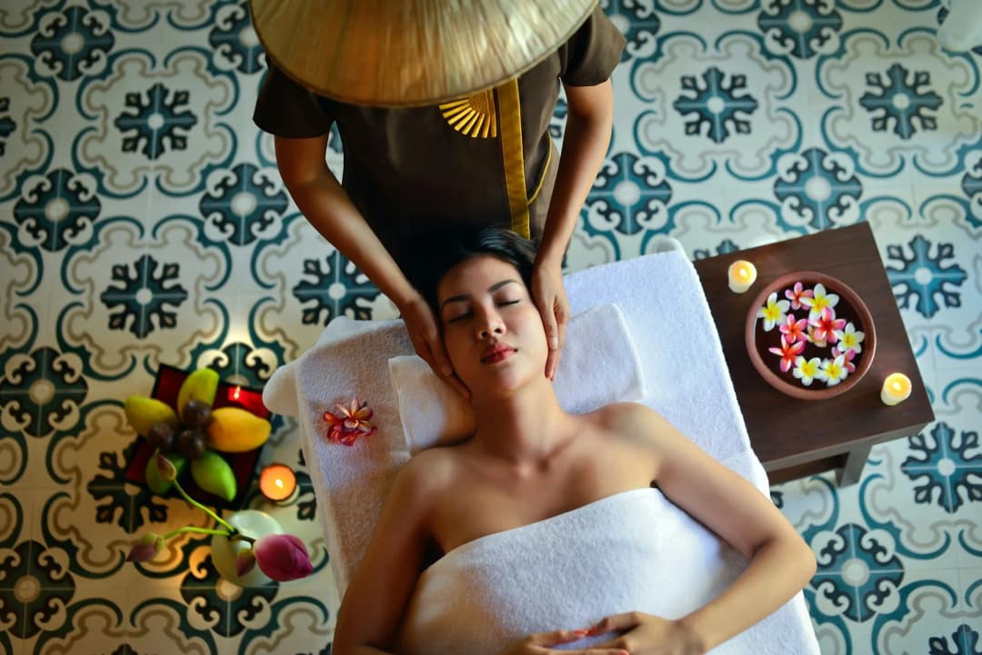 A woman receiving a care procedure in a spa