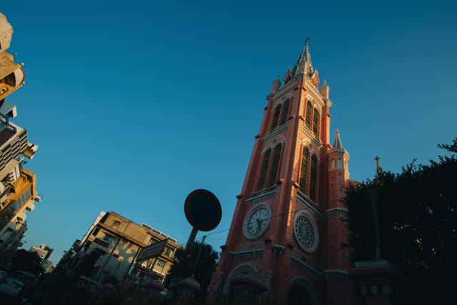 Capture of the iconic pink church tower in warm sunset light.