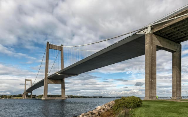 Scenic view of the New Little Belt Bridge spanning the coast in Middelfart, Denmark.