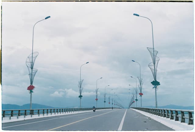 A long bridge in Quy Nhon, Vietnam, stretching into the distance.