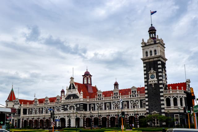 The iconic Dunedin Railway Station in New Zealand, showcasing its unique architecture and historic charm.