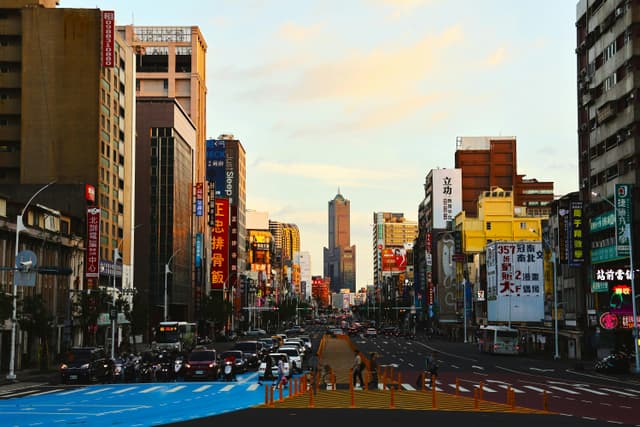 Explore the bustling streets of Kaohsiung, Taiwan, captured in stunning evening light.
