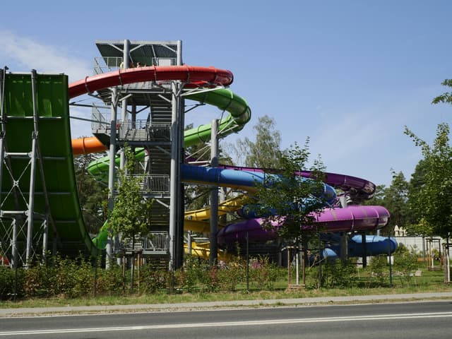 Vibrant outdoor water slides in Zielona Góra, perfect for summer fun and adventure.