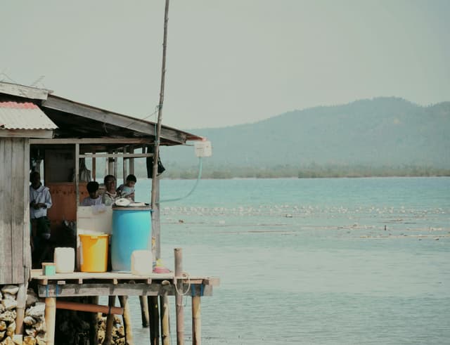A rustic stilt house by the sea in Zamboanga City, capturing everyday life.